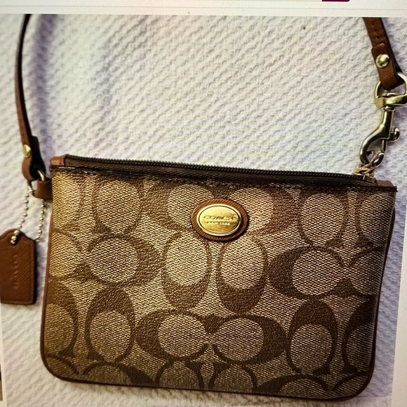 Coach Handbags - Coach Brown Signature Canvas Crossbody Wristlet
